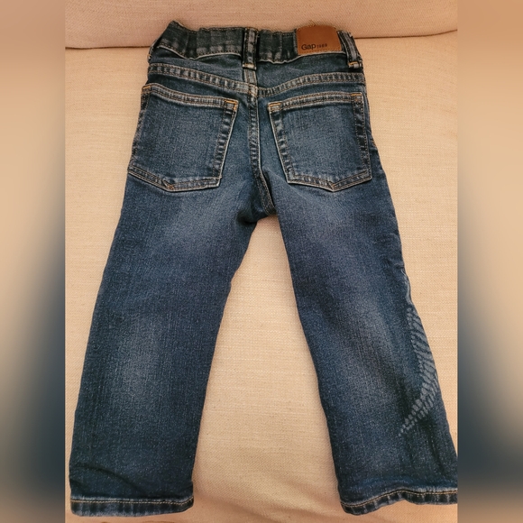 Baby GAP Boy's jeans size 2T w/dinosaur pattern - Picture 2 of 3